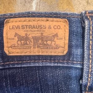 Levi's Men's Deep Blue Denim Jeans with Tan Leather Patch